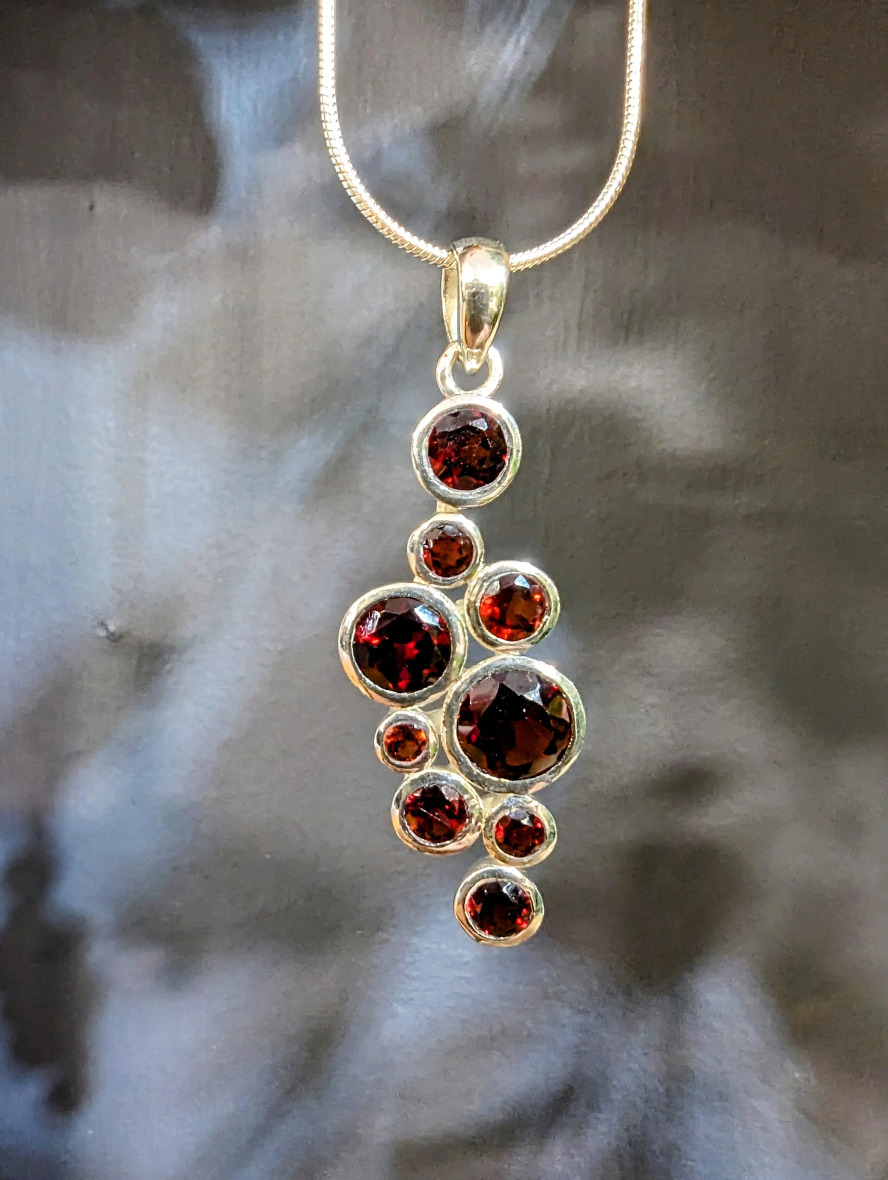 9 Stone Garnet Silver Pendant