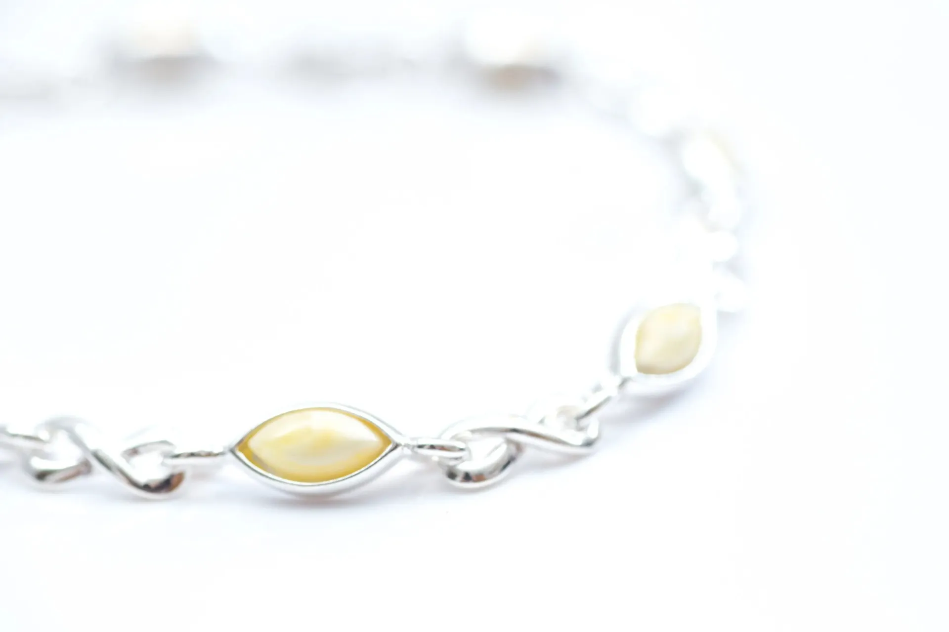 Elegant Butterscotch Amber Infinity Bracelet - Stylish & Timeless Jewelry | Shop Now